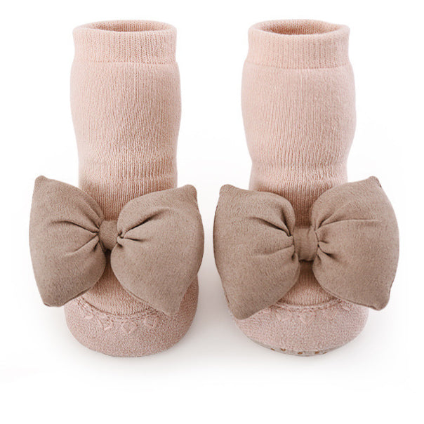 Baby Girl Big Bows Design Non-Slip Mid Tube Shoes in white, pink, beige, and brown colors, showcasing a stylish and comfortable design.