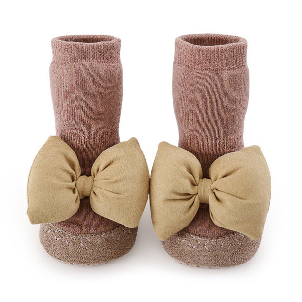 Baby Girl Big Bows Design Non-Slip Mid Tube Shoes in white, pink, beige, and brown colors, showcasing a stylish and comfortable design.