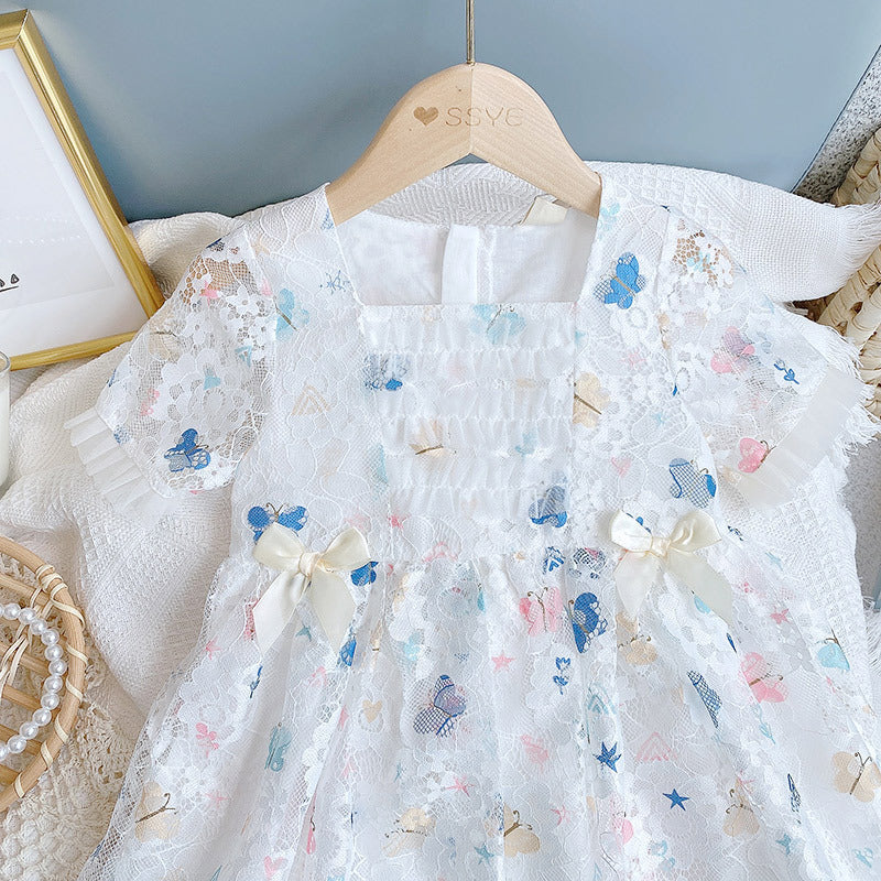 A beautiful baby girl dress featuring a butterfly print and lace patchwork design with a square collar, perfect for summer occasions.