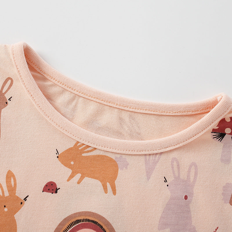 A soft cotton shirt for baby girls featuring a playful cartoon bunny print in vibrant pink color, perfect for spring and autumn wear.