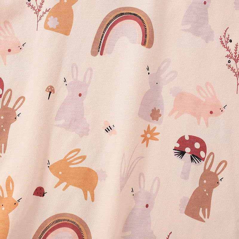 A soft cotton shirt for baby girls featuring a playful cartoon bunny print in vibrant pink color, perfect for spring and autumn wear.