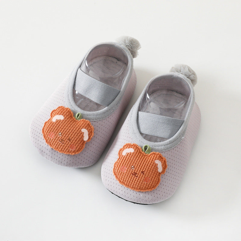 Adorable baby girl cartoon pattern non-slip toddler shoes featuring a fun tail design in various colors.