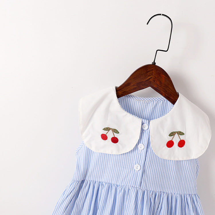 A vibrant baby girl dress featuring cherry embroidery and a color blocking lapel design, perfect for summer wear.