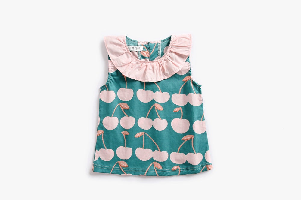 Baby girl wearing a cherry print ruffle design O-neck top and shorts set, perfect for summer outings.