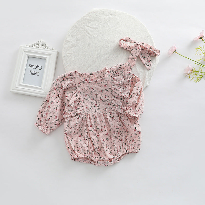 Baby girl long sleeve bodysuit featuring a ditsy flower pattern in soft pink, perfect for spring and autumn wear.