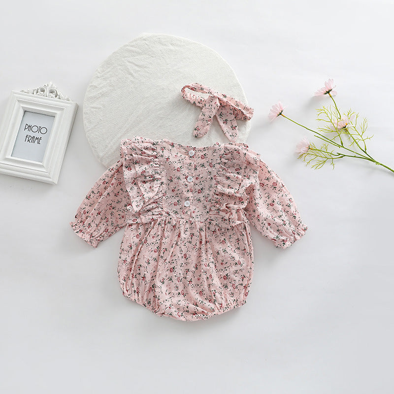 Baby girl long sleeve bodysuit featuring a ditsy flower pattern in soft pink, perfect for spring and autumn wear.