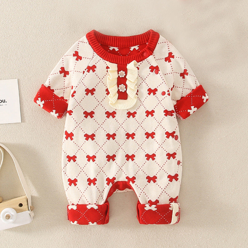 A vibrant red baby girl romper featuring floral embroidery, perfect for autumn and spring seasons.