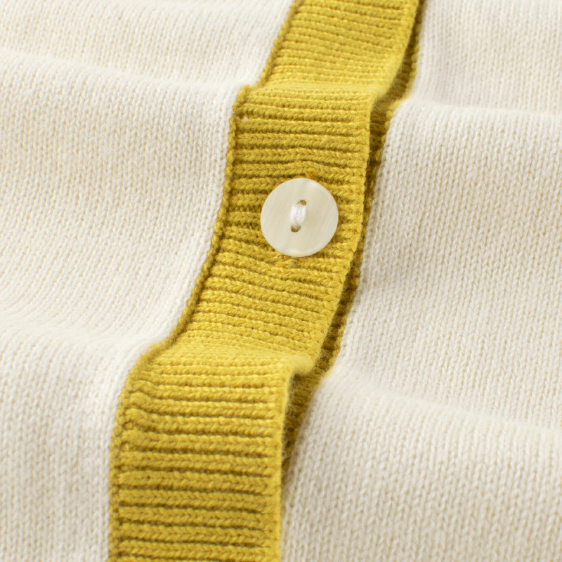 Baby girl knitwear featuring floral embroidery and colorblock design in vibrant yellow, perfect for spring and autumn.