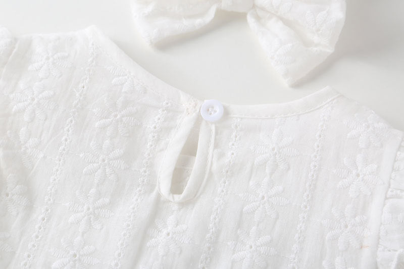 Baby girl sleeveless onesies with floral embroidery pattern in white cotton fabric, perfect for summer wear.