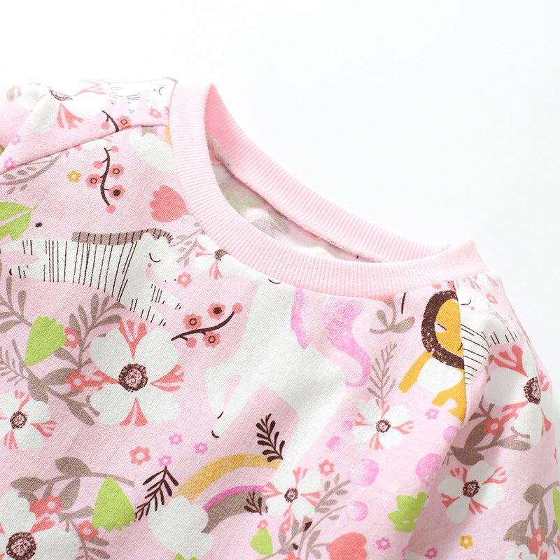 Baby girl wearing a pink floral pattern long sleeves hoodie dress, showcasing its soft cotton fabric and charming design.