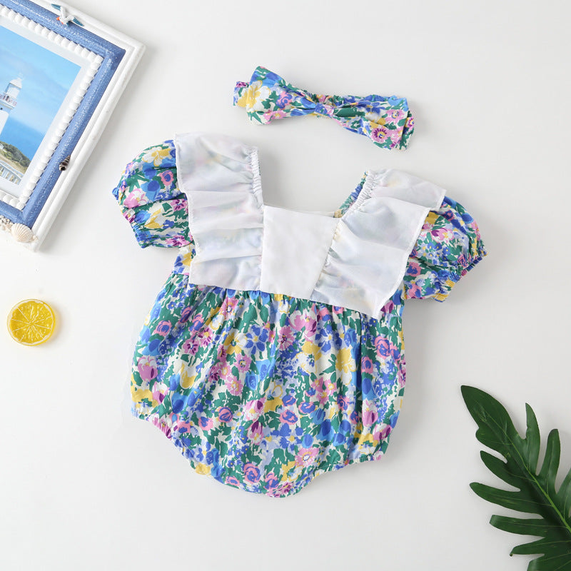 Baby girl onesie featuring a floral pattern, white bow patchwork, and square neckline, perfect for summer wear.