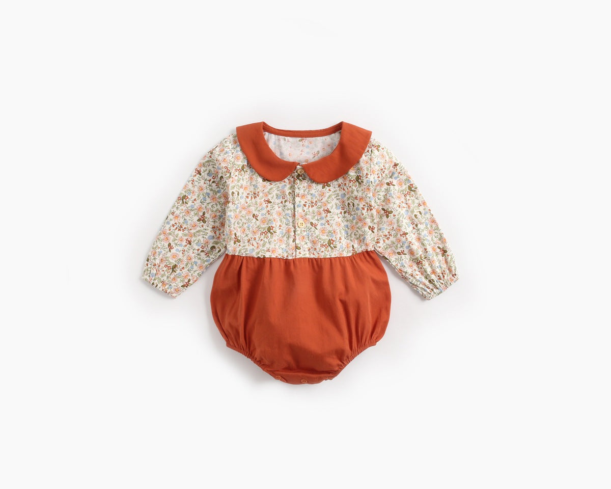 Baby girl long sleeve onesie with floral print and color blocking design in red and yellow, perfect for spring and summer.