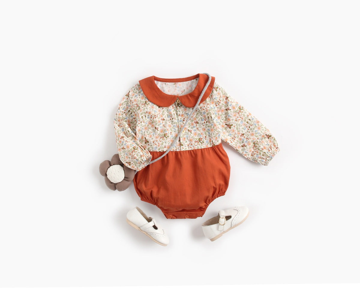 Baby girl long sleeve onesie with floral print and color blocking design in red and yellow, perfect for spring and summer.