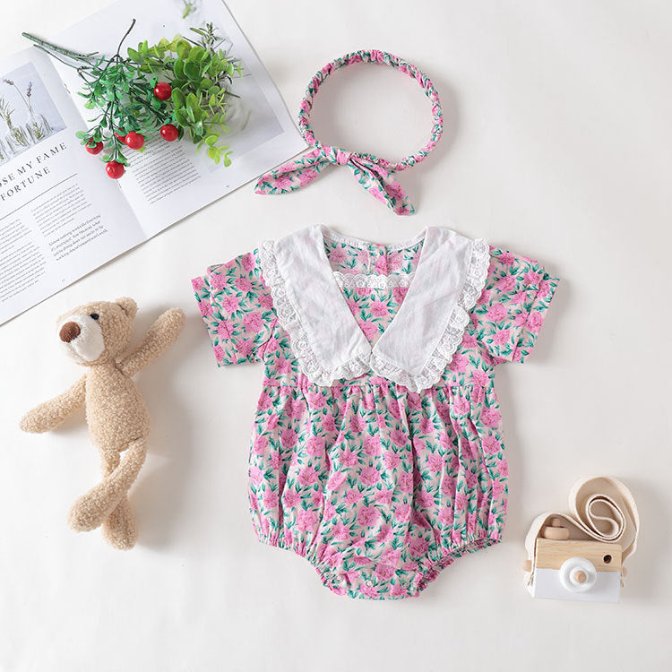 Baby girl floral print onesie with lace collar, featuring a patchwork design in purple, perfect for summer wear.