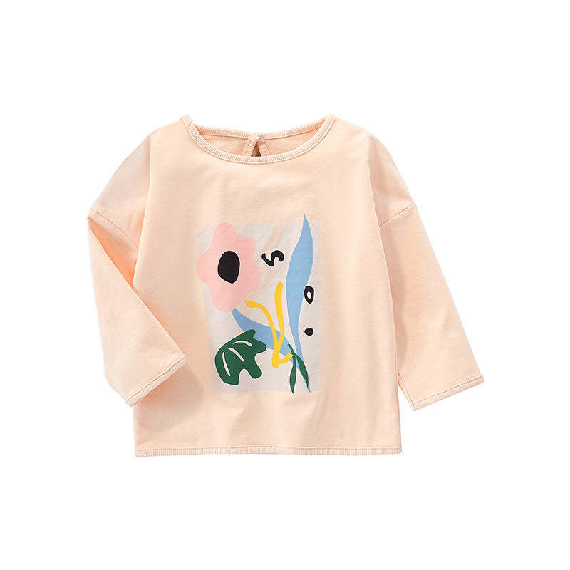 Baby girl wearing a floral print pullover soft cotton top in apricot color, showcasing a vibrant floral pattern.