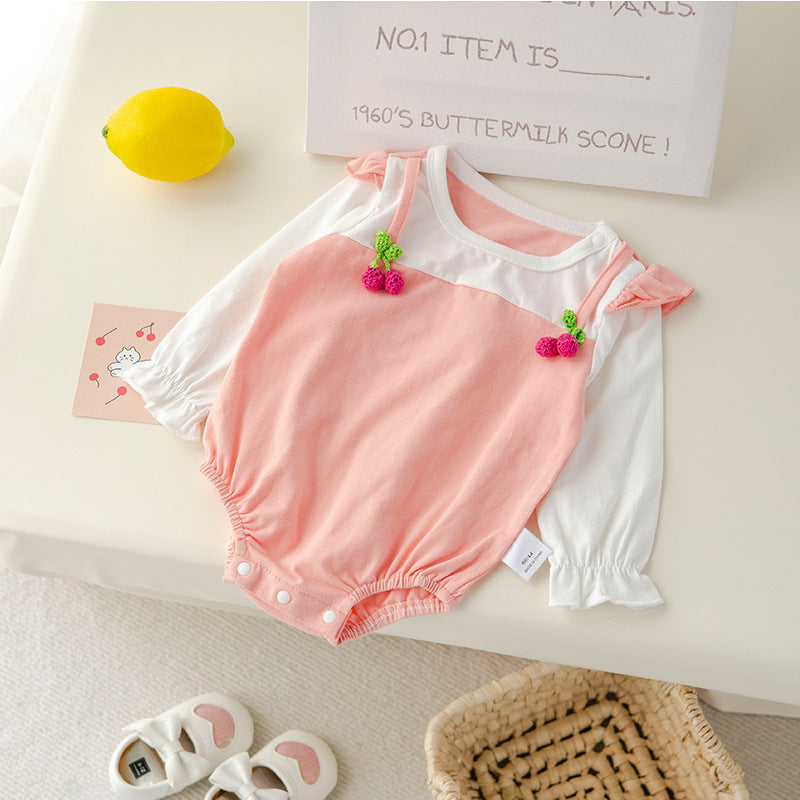 Baby girl bodysuit with fruit patches in vibrant colors, perfect for spring and autumn.