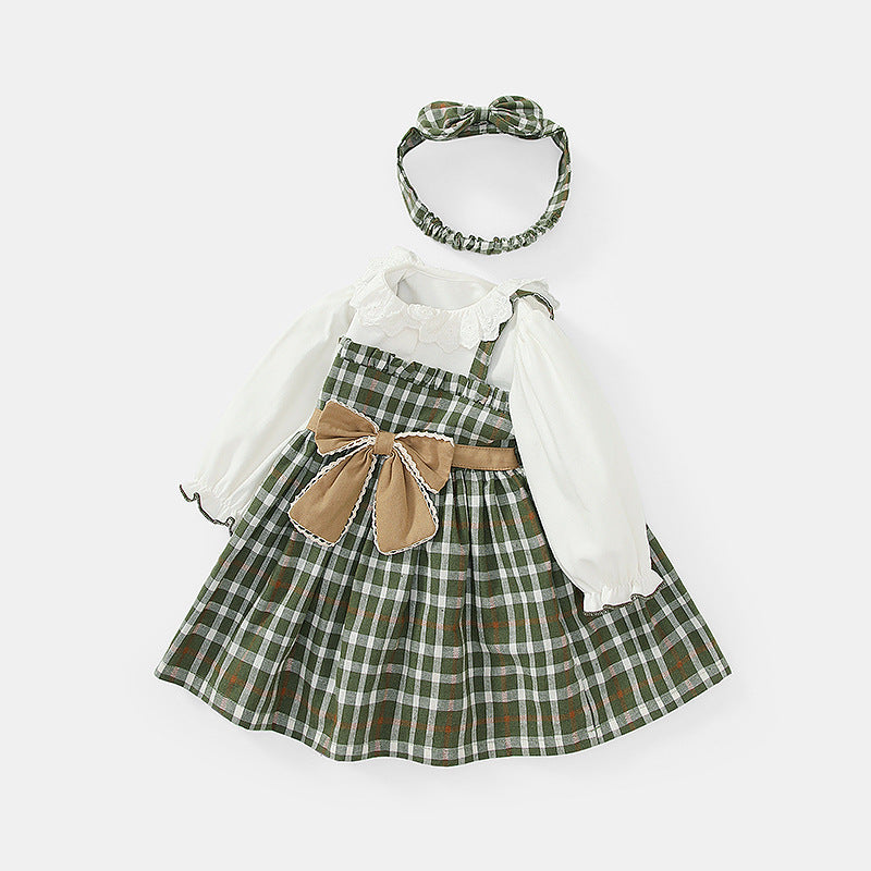 Baby girl dress featuring lace, plaid pattern, and bow tie design in green color, perfect for special occasions.