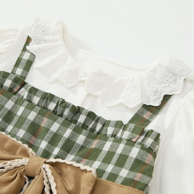 Baby girl dress featuring lace, plaid pattern, and bow tie design in green color, perfect for special occasions.