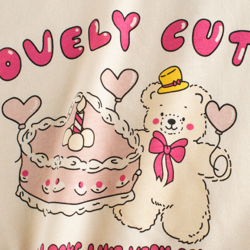 Baby girl t-shirt featuring a lovely cake bear print with color-matching sleeves, perfect for summer wear.