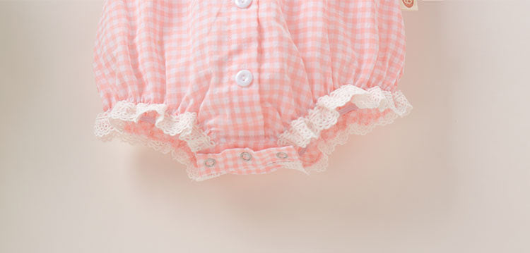 Baby girl plaid pattern onesie with lace patchwork design, short sleeves, and button-down closure in pink color.