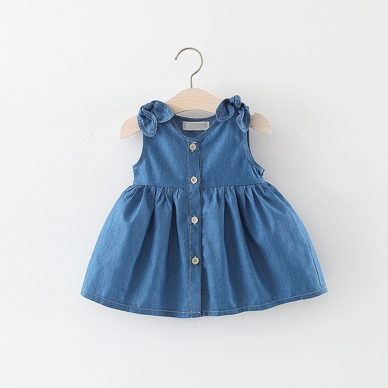 A stylish baby girl solid blue denim dress made from breathable cotton, perfect for summer wear.