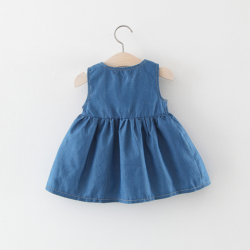 A stylish baby girl solid blue denim dress made from breathable cotton, perfect for summer wear.