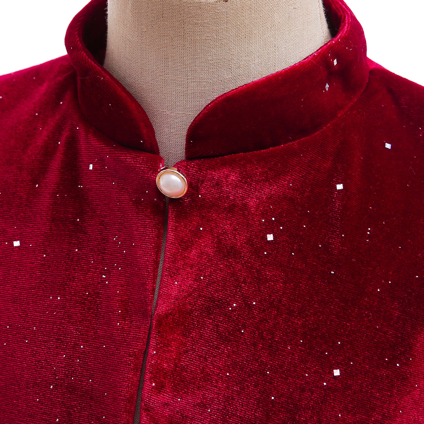 A beautiful red shawl cape for baby girls, featuring a delicate bow detail, perfect for Christmas parties and winter wear.