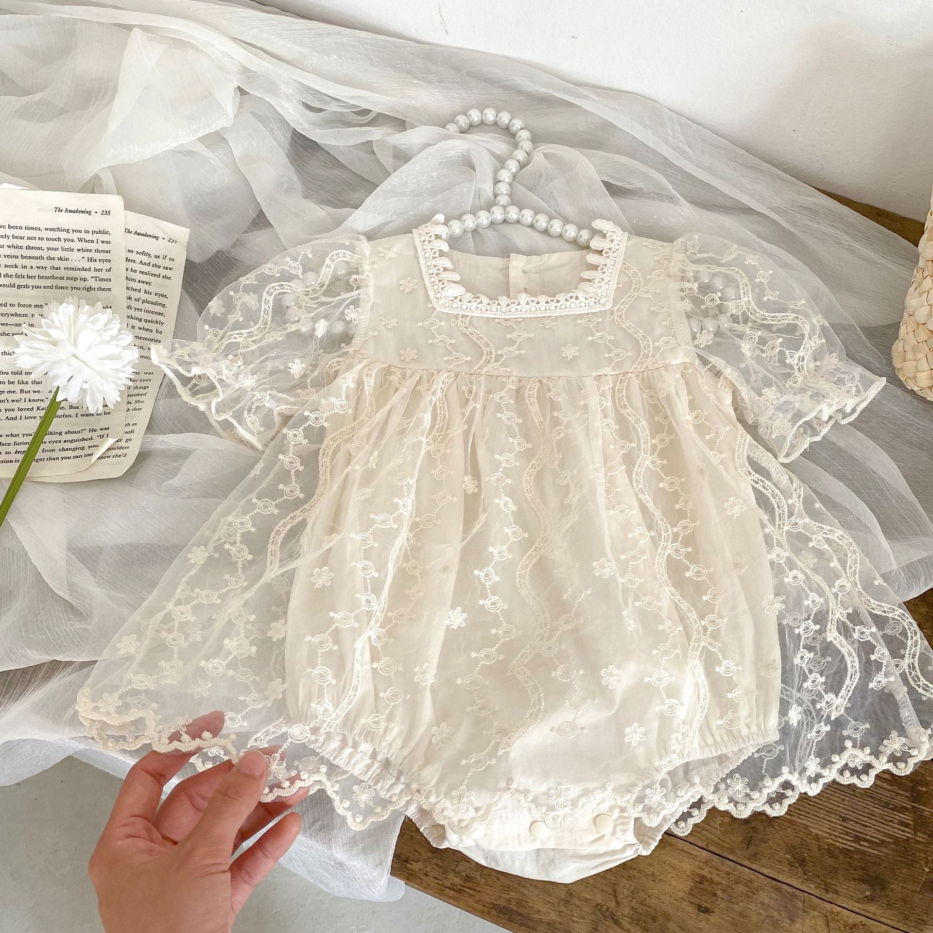 Baby girl dress featuring solid color, floral embroidery, and mesh design, perfect for summer occasions.