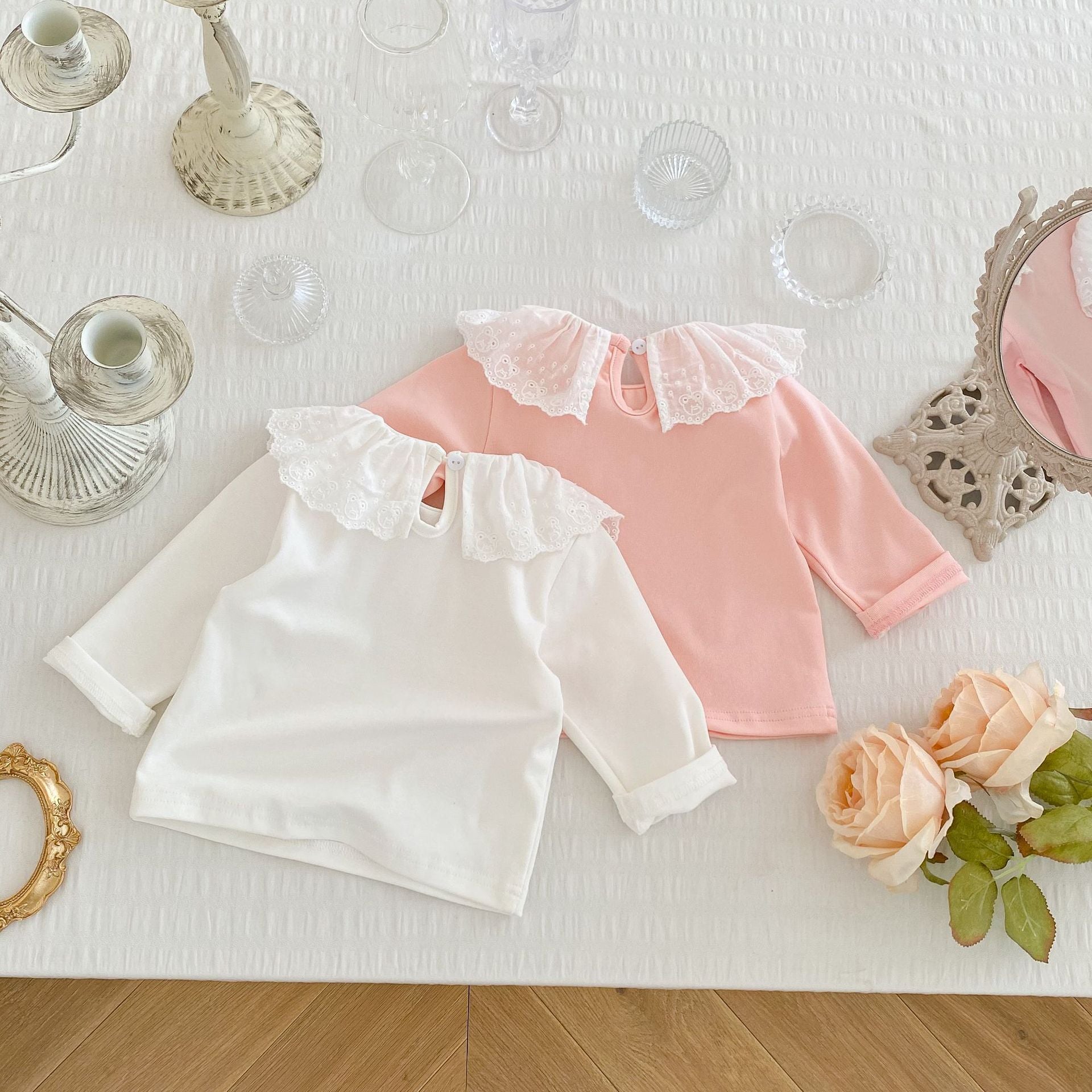 Baby Girl Solid Color Mesh Doll Neck Long Sleeve Top in white and pink, featuring a doll neckline and ruffled cuffs.