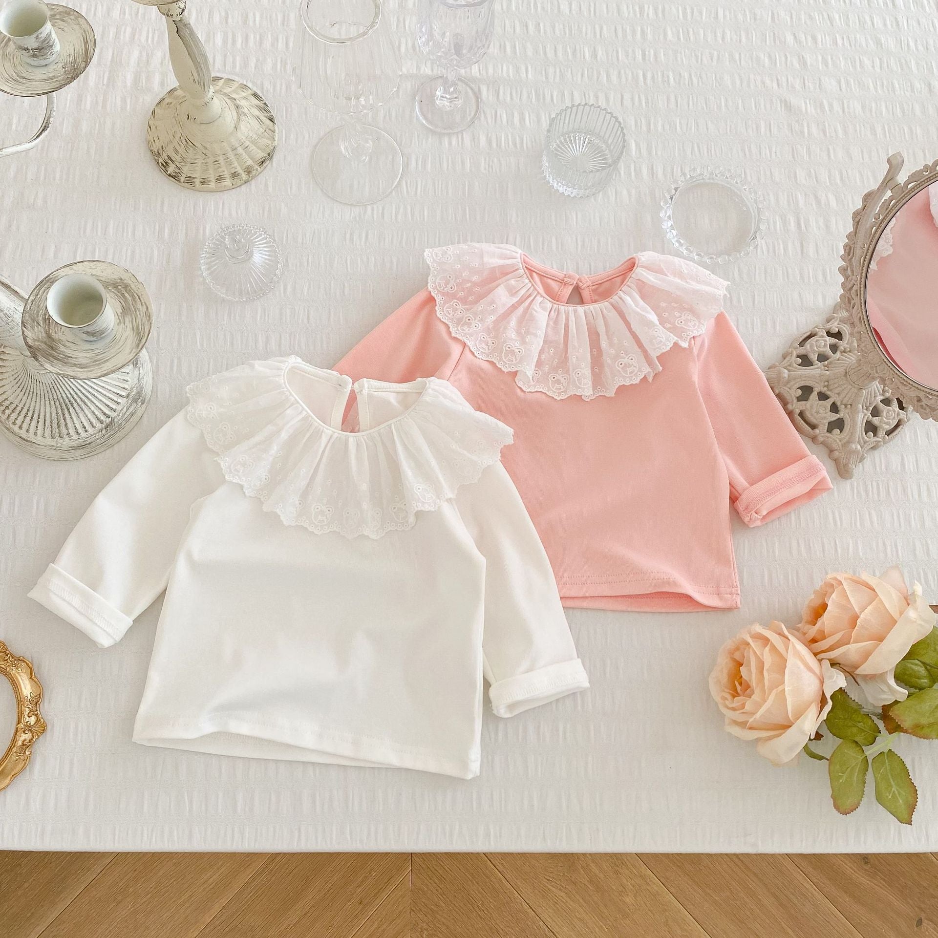 Baby Girl Solid Color Mesh Doll Neck Long Sleeve Top in white and pink, featuring a doll neckline and ruffled cuffs.