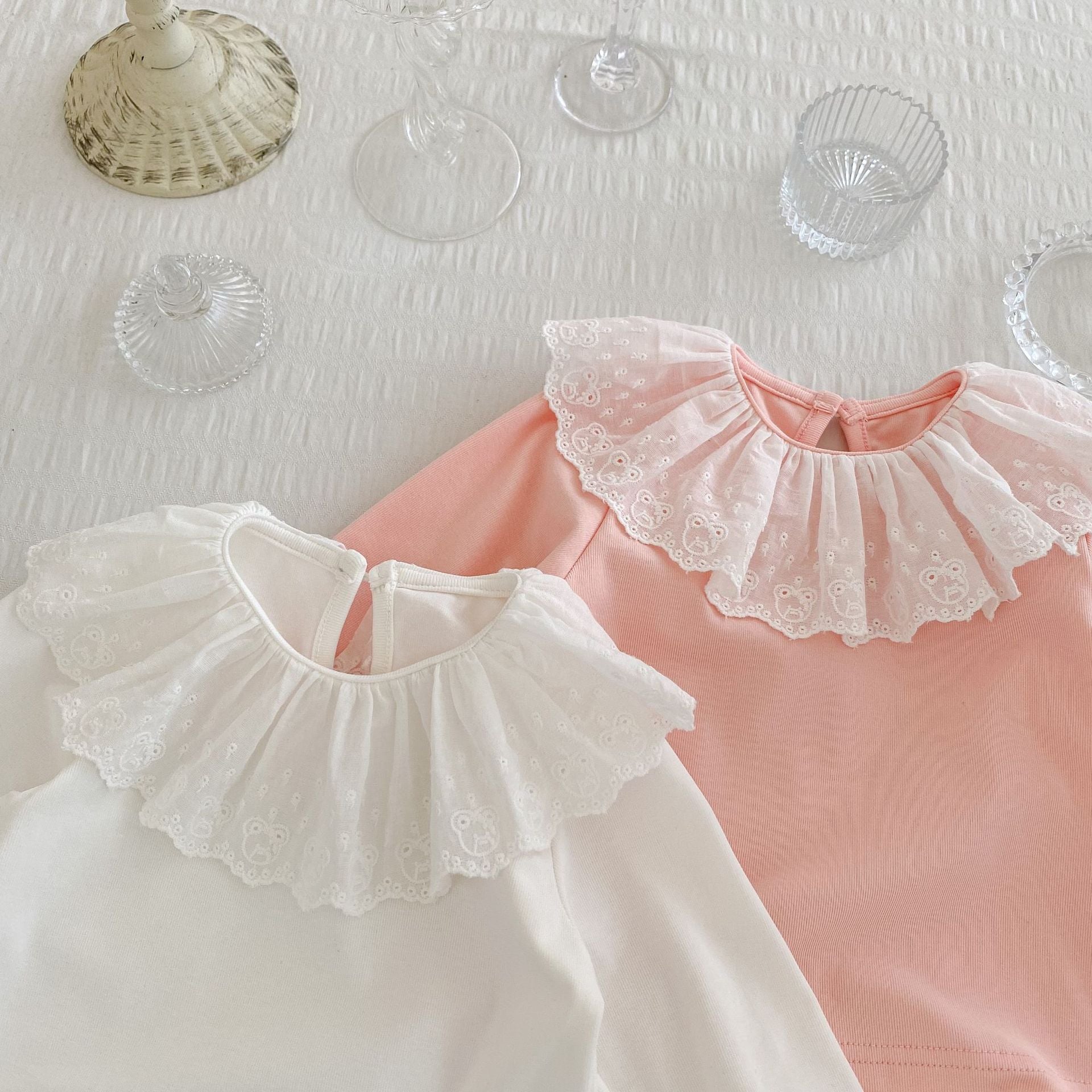 Baby Girl Solid Color Mesh Doll Neck Long Sleeve Top in white and pink, featuring a doll neckline and ruffled cuffs.