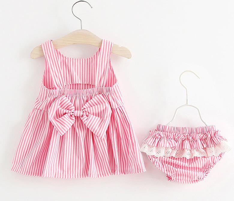 Baby girl wearing a striped pattern dress combo with shorts, showcasing a playful and stylish summer outfit in pink and blue.