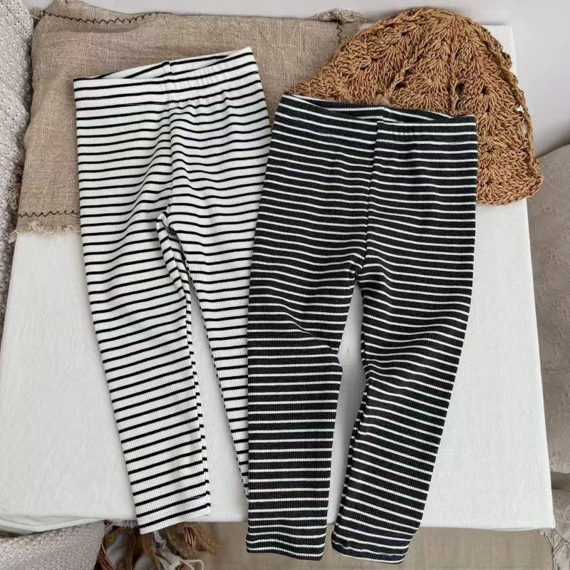 Baby Girl Striped Pattern Elastic Tight Knit Pants in white and black, featuring a soft knit fabric and elastic waistband.