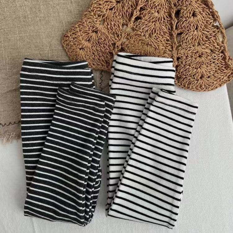 Baby Girl Striped Pattern Elastic Tight Knit Pants in white and black, featuring a soft knit fabric and elastic waistband.