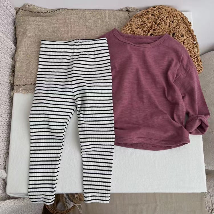 Baby Girl Striped Pattern Elastic Tight Knit Pants in white and black, featuring a soft knit fabric and elastic waistband.