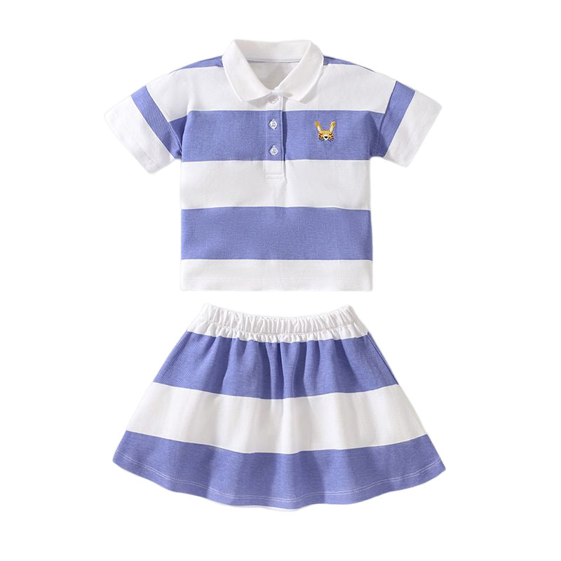 Baby girl wearing a blue striped polo neck shirt with a pleated skirt, perfect for summer outings.