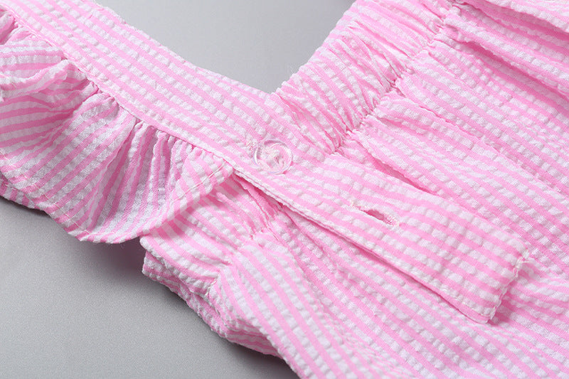 Baby girl sleeveless onesie featuring a striped pattern with ribbon patchwork and ruffle cuffs in pink and blue colors.