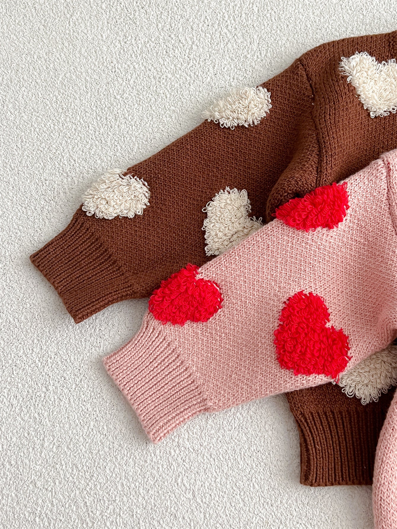 Baby girl long sleeve pullover sweater in pink and coffee with heart pattern, perfect for spring, autumn, and winter.