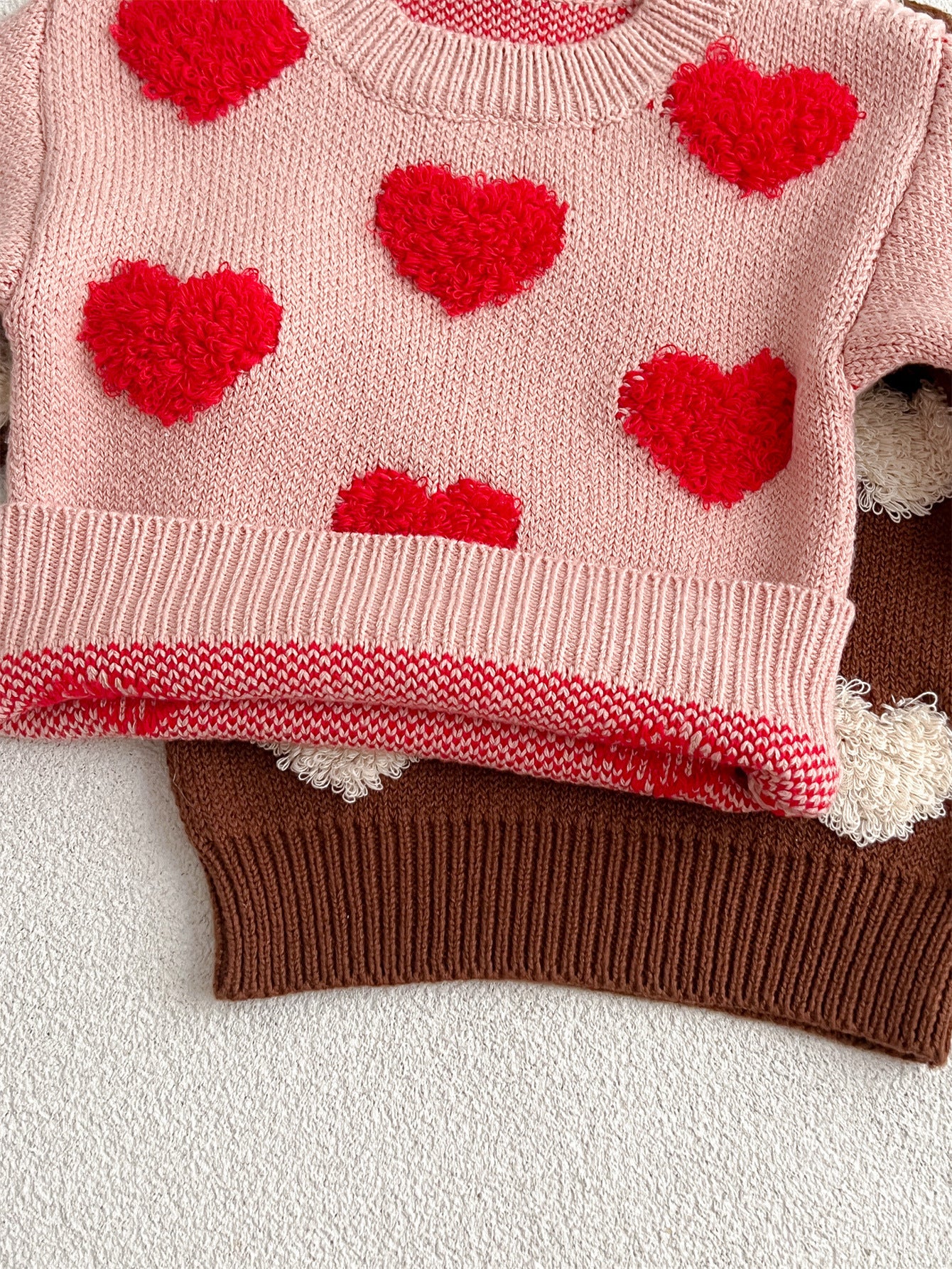 Baby girl long sleeve pullover sweater in pink and coffee with heart pattern, perfect for spring, autumn, and winter.