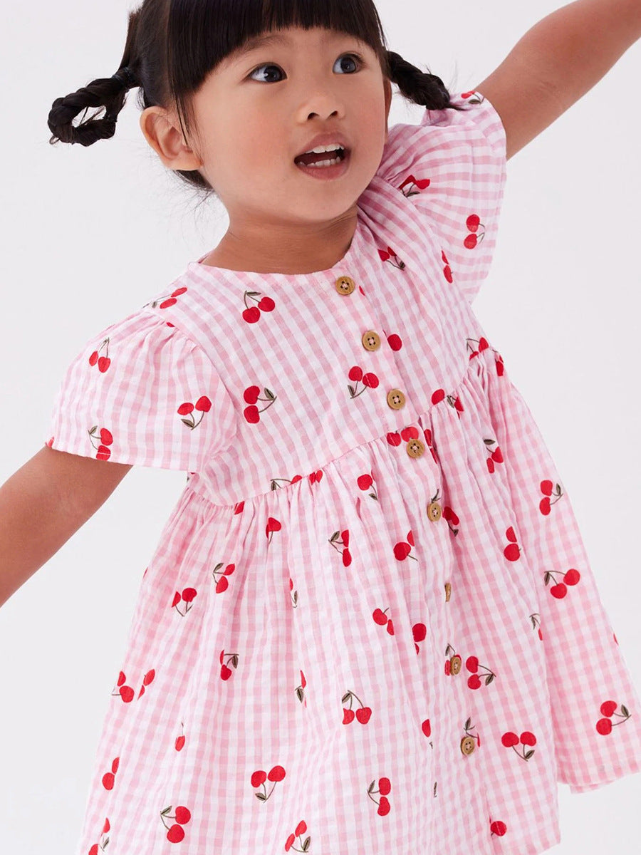 Baby Girls Crew Neck Plaid Cherry Print Short Sleeves Dress in pink with plaid and cherry patterns, perfect for summer wear.