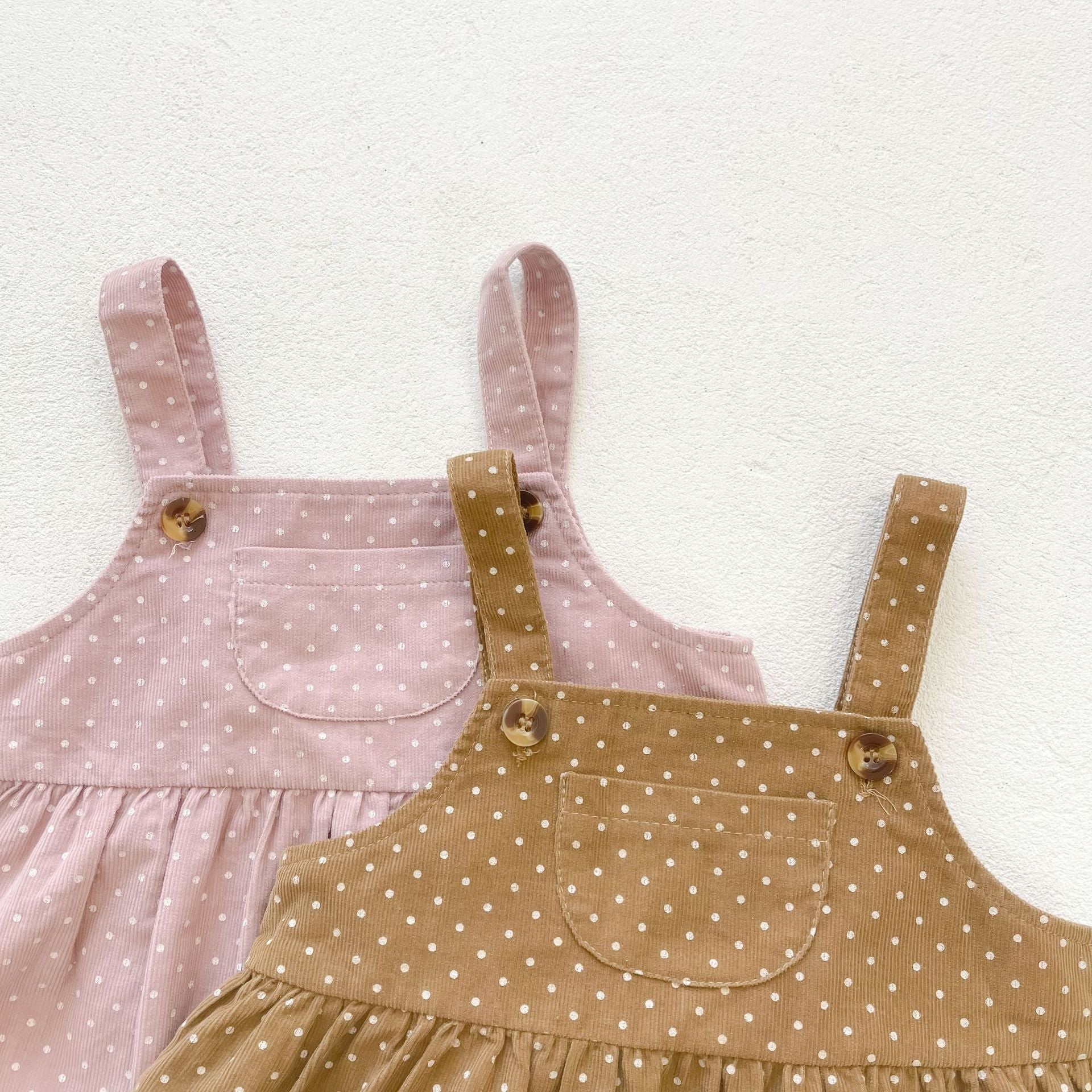 Baby girls' dot print dress combo featuring a solid top in pink and beige, made from soft cotton fabric.