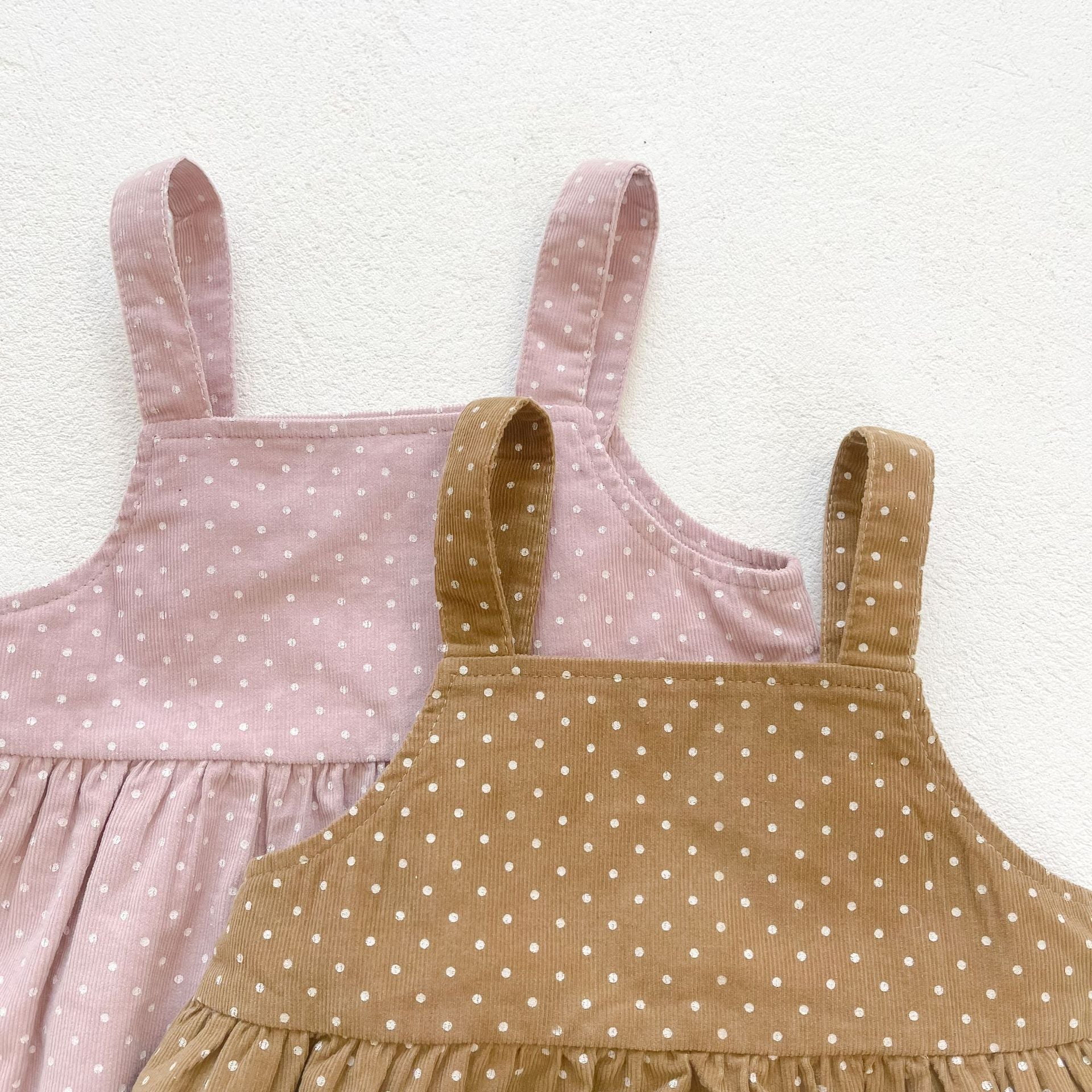 Baby girls' dot print dress combo featuring a solid top in pink and beige, made from soft cotton fabric.