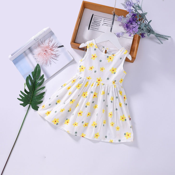 A beautiful baby girls floral print sleeveless dress featuring vibrant colors and a round collar, perfect for summer occasions.