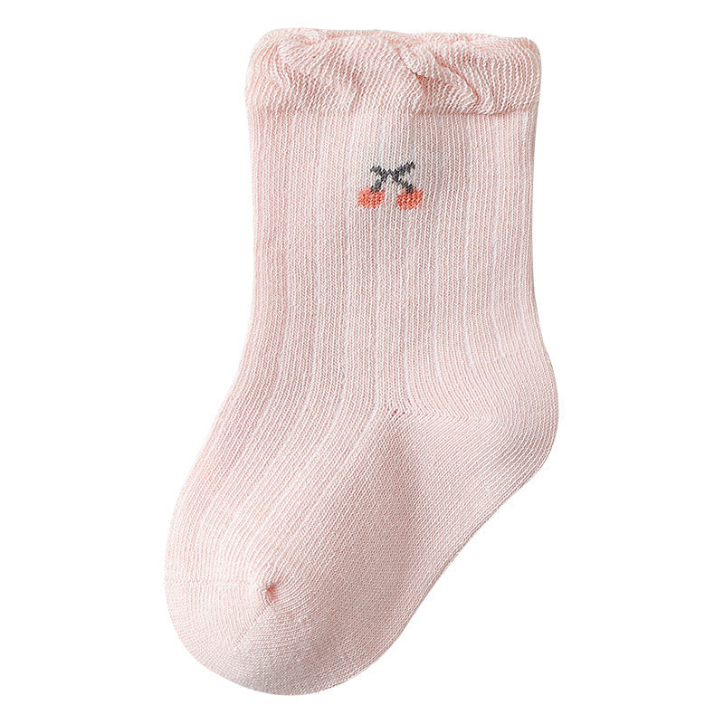 A pair of Baby Girls Frilled-Edges Breathable Mid-Calf Socks in various colors with fruit patterns, showcasing their soft fabric and frilled edges.