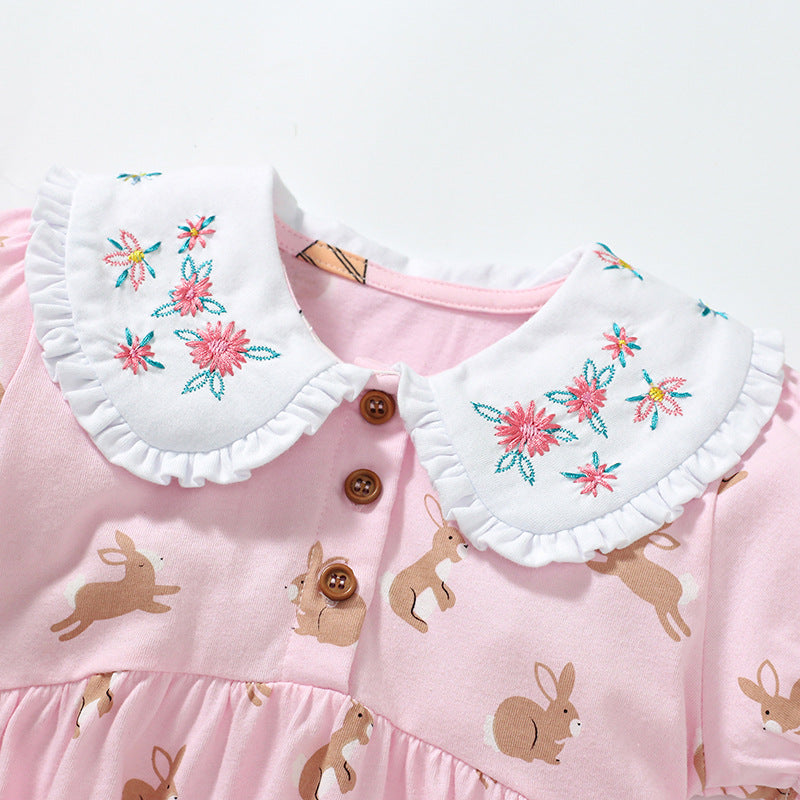 Baby girls dress featuring a Peter Pan collar, floral design, and rabbits pattern in pink cotton fabric, perfect for summer wear.