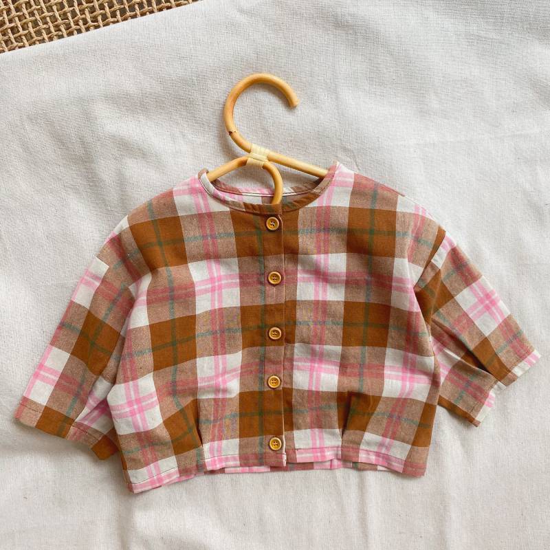 Baby girls plaid pattern t-shirt with seven point sleeves in pink, made from soft cotton material.