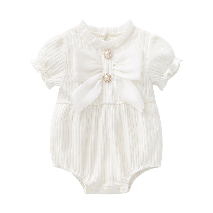 Baby girls solid color lace design puff-sleeved onesies in white, red, and pink, featuring a bow decoration.