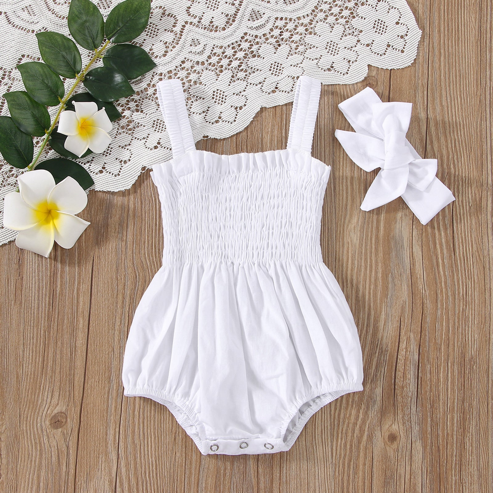 Baby girls solid color sleeveless summer bodysuit onesie with matching headband in soft cotton fabric.