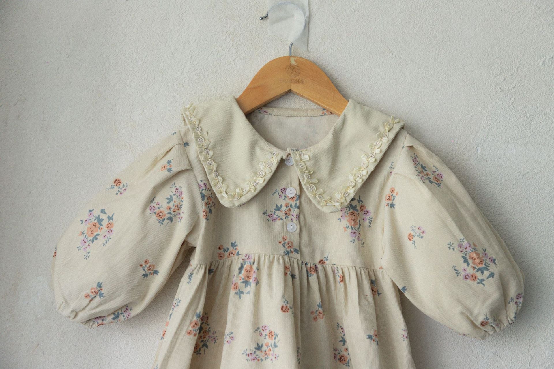 Baby Girls Turndown Collar Floral Soft Spring Vintage Dress in purple and apricot colors, featuring a floral pattern and soft fabric.