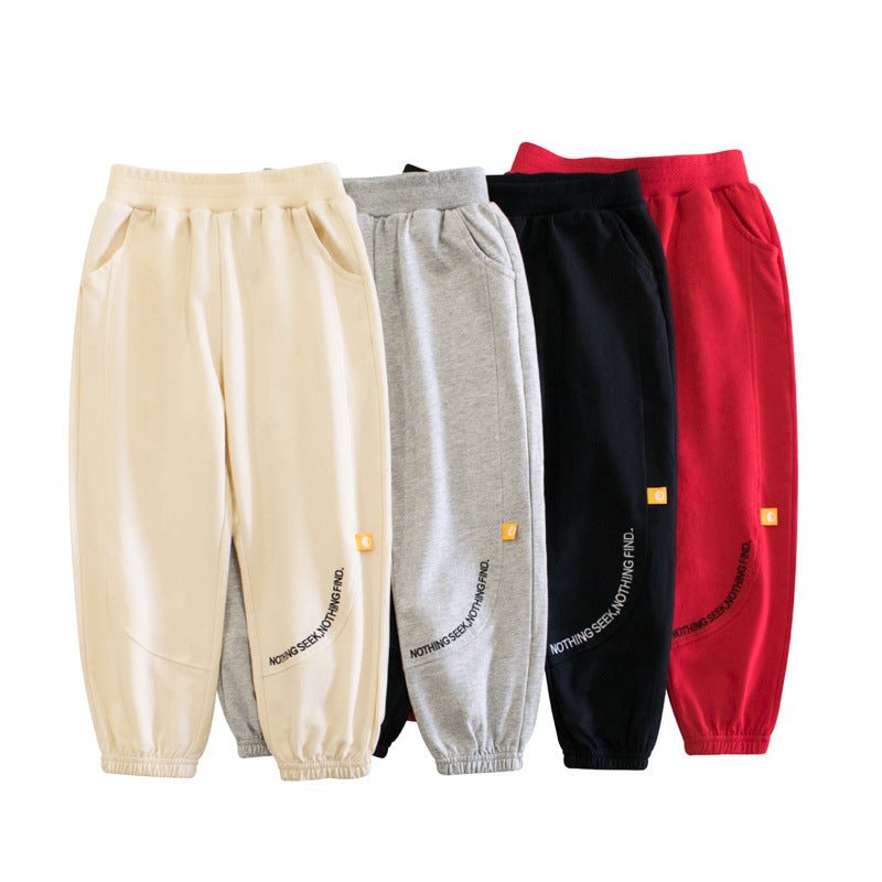 Baby Letters Pattern Solid Color Trousers Pants in various colors, showcasing a playful design suitable for boys and girls.